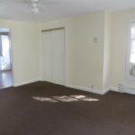 very spacious empty property with AC and window of a rental property managed by TESO Property Management in Stony Point